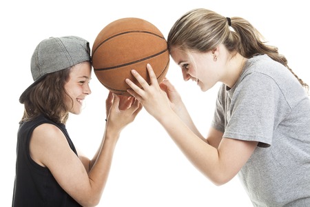 A Portrait of brother and sister with a basket ballの写真素材