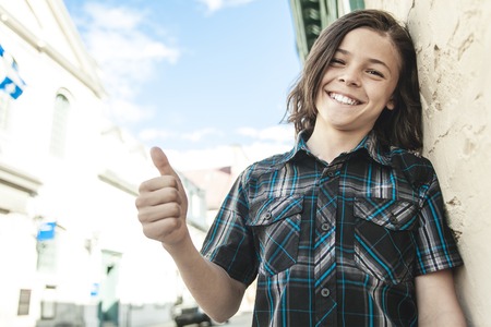 A Portrait Of Young Smiling Teen Boyの写真素材