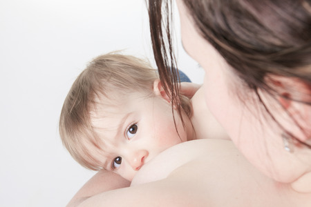 Mother who feed his baby with is breastの写真素材