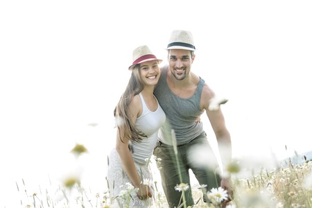 A Young couple in love outdoor at the sunsetの写真素材
