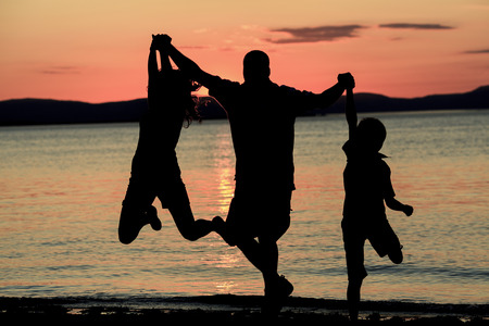 A High Five at Sunsetの写真素材