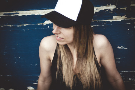 A Portrait of young beautiful skater girl posingの写真素材