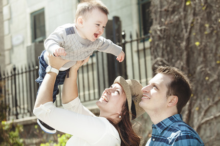 A young mother with her baby boyの写真素材