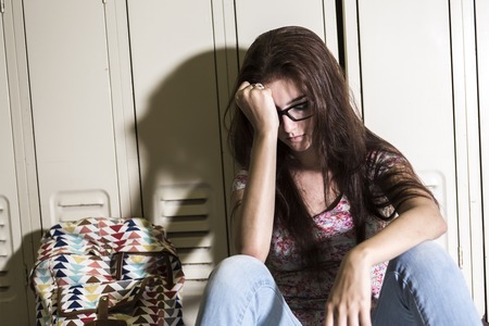 A Young handsome female student at the collegeの写真素材