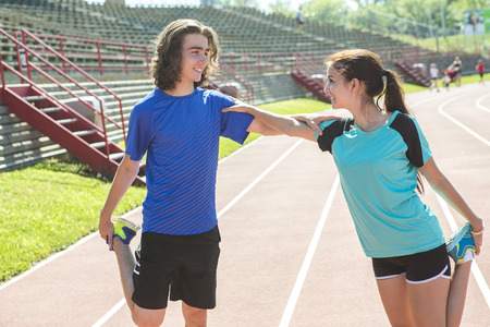 two happy child doing training workout and sport activityの写真素材