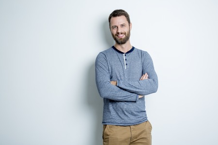 A Portrait of a men in studio gray backgroundの写真素材