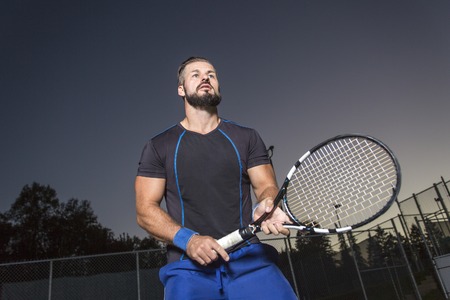 A tennis player having fun to playの写真素材