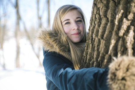 An Attractive young woman in wintertime outdoorの写真素材