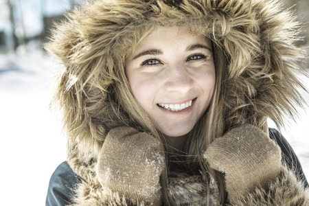 An Attractive young woman in wintertime outdoorの写真素材