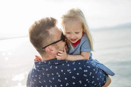 A Father and Daughter Playing, Having Fun Together