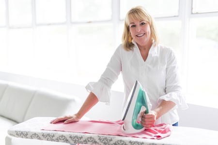 A Senior casual woman style portrait, studio shot, isolated on white backgroundの写真素材