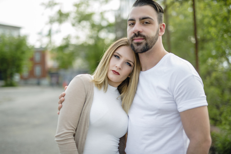 A Couple close to a fence in a dayの写真素材