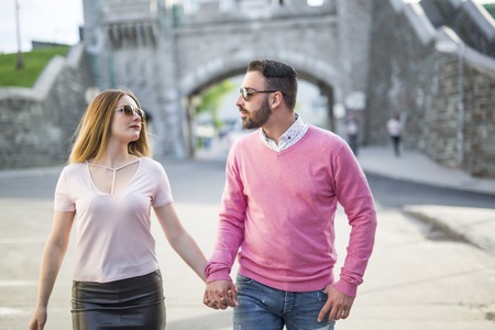 A Couple Dating Happiness Traveling Using Smart Phoneの写真素材