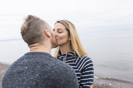 portrait of living young couple at the beach