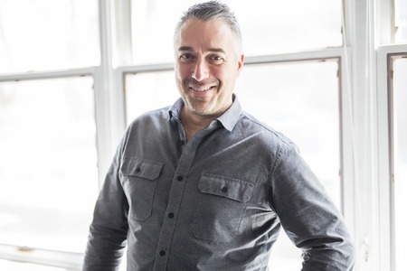 Portrait of handsome and happy guyの写真素材