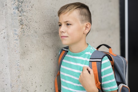Pre teen boy outside at schoolの写真素材