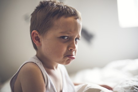 Young Boy on bed