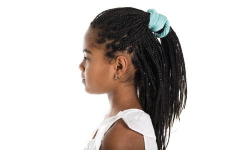 Adorable african little girl on studio white background