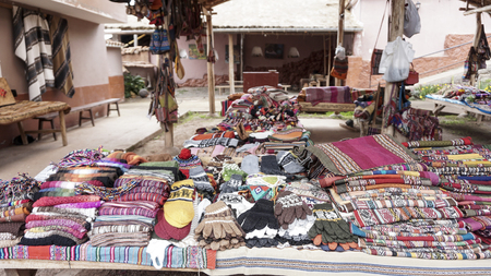 peruvian clothes and bags on the marketの写真素材