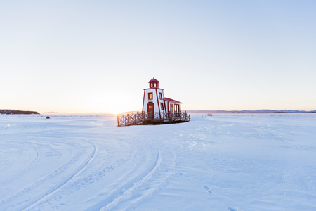 A nice Lighthouse in winter season in quebecの写真素材