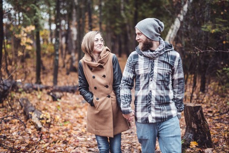 A nice Couple in the autumn parkの写真素材