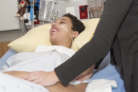 A Sick patient lying on bed in hospital for medical background