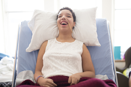 A Sick patient lying on bed in hospital for medical backgroundの写真素材