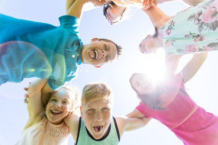 Group of child have fun on a fieldの写真素材