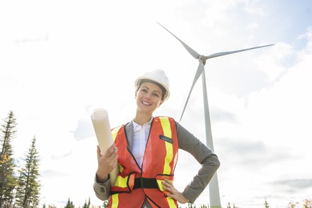 A Technician woman Engineer in Wind Turbine Power Generator Stationの写真素材