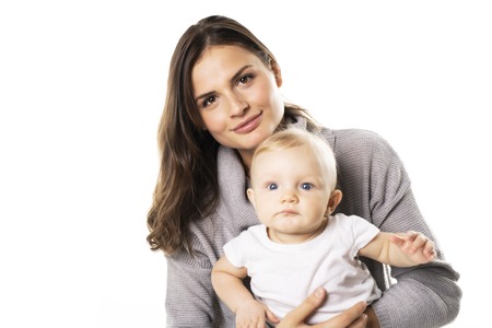 A mother holdng his baby on studio white background