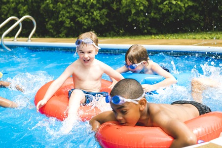 Children in outside swimming pool