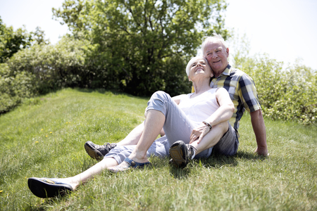 A nice senior couple outside having good time togetherの写真素材