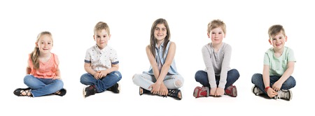 A Group Of five Young Children In Studioの写真素材