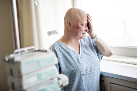 A woman in hospital suffering from cancer