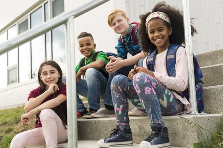 group pre-teen School Pupils Outside of the Classroomの写真素材