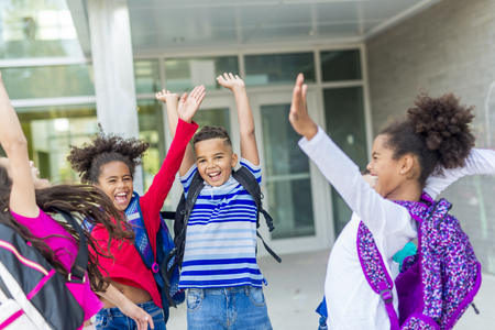 pre-teen School Pupils Outside of the Classroomの写真素材
