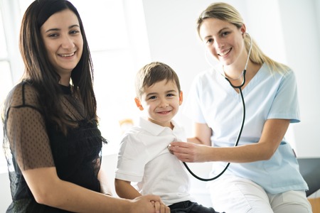 A cute Child Patient Visiting Doctors Officeの写真素材