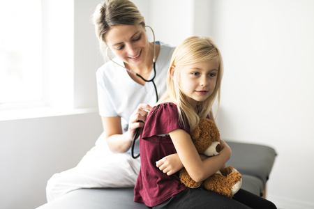 A cute Child Patient Visiting Doctors Officeの写真素材
