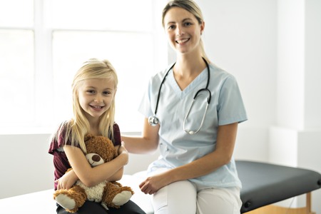 A cute Child Patient Visiting Doctors Officeの写真素材