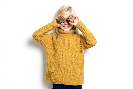 A Cute girl 5 year old posing in studioの写真素材