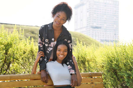 Latin American Mother with her Daughter togetherの写真素材