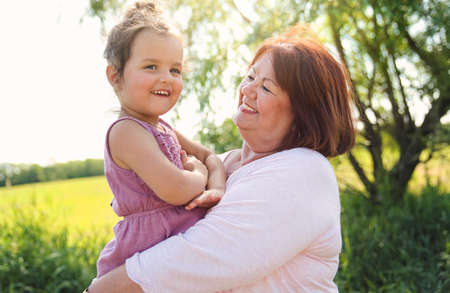 grandmother spending time with littledaughter during the day
