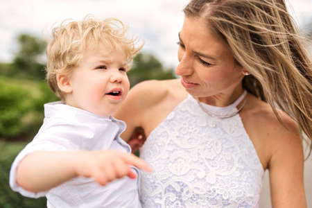 Happiness mother with her baby son on the day time