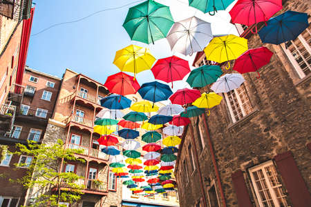 Lot of Umbrellas in Petit Champlain street Quebec cityの写真素材