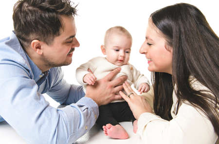 A Young mother and father with newborn