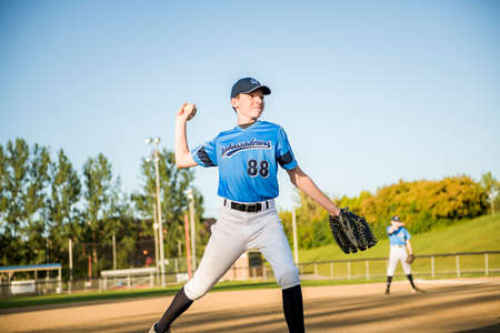 baseball pitcher players standing on the playground