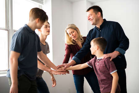 A portrait of a big Family at home having fun togetherの写真素材