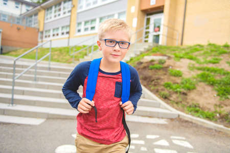 A nice Portrait of cute boy with backpackの写真素材