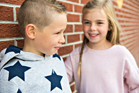 boy problem at school, sitting and consoling child each other