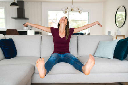Brunette having good time on the living room